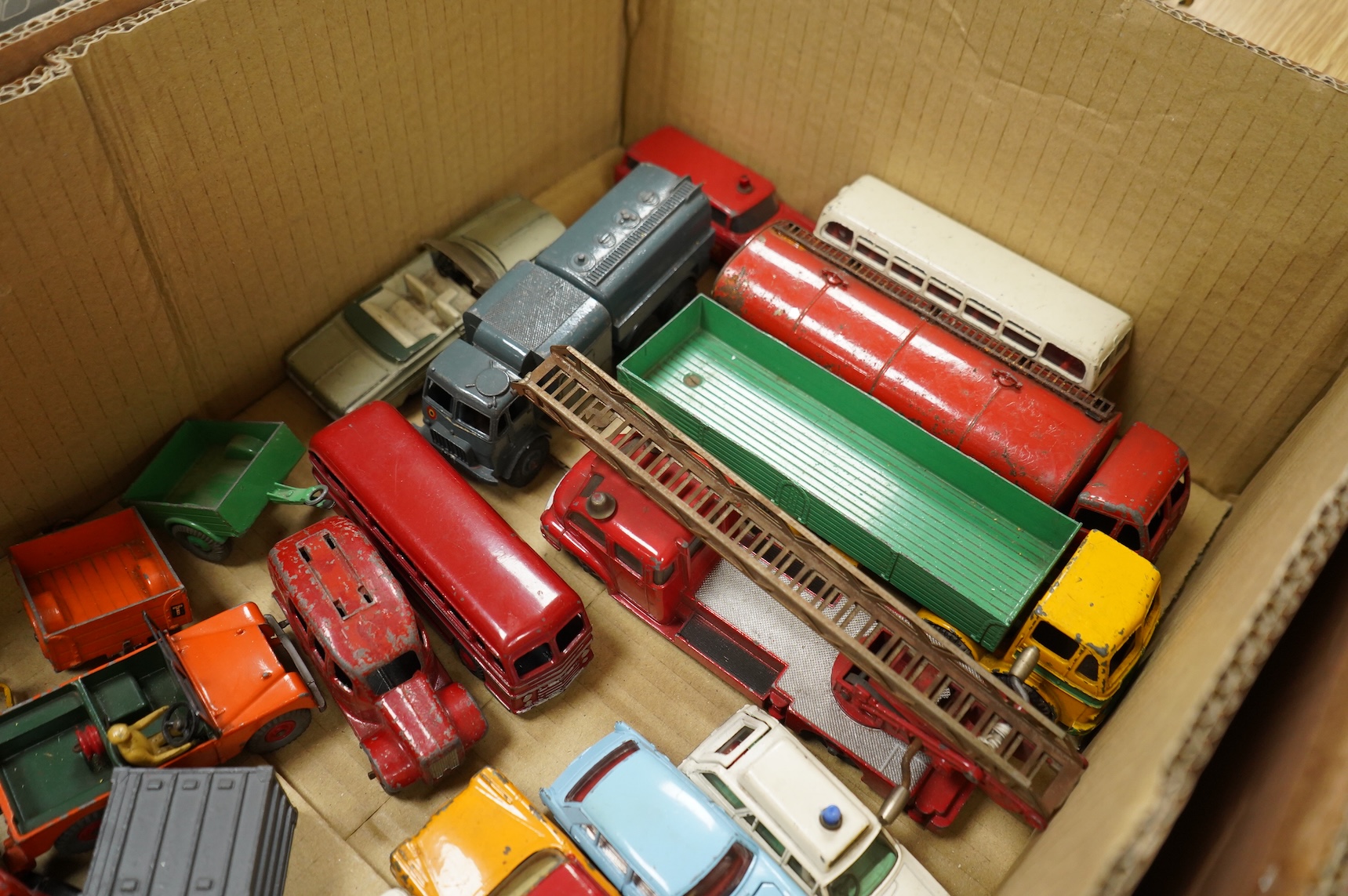 A collection of thirty-five Dinky Toys and five Spot On diecast vehicles, including; a Foden tanker, Leyland octopus, Maudsley horsebox, telephone service van, Royal mail van, and a selection of other cars and commercial